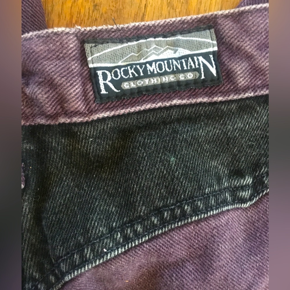 - Fancy purple and black Rockies jeans. High rise.